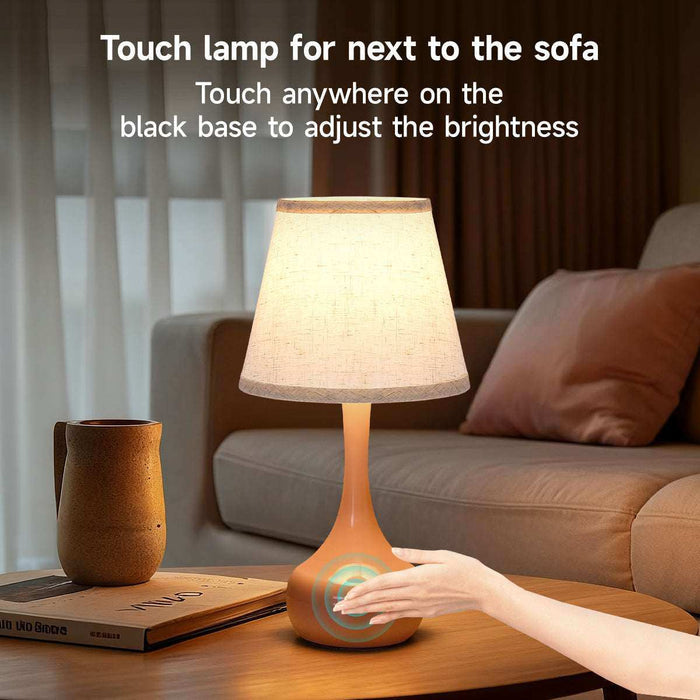2-piece set of three level dimming small table lamps with fabric shades on a wooden surface