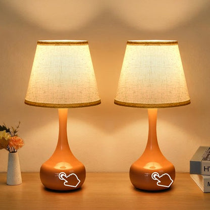 2-piece set of three level dimming small table lamps with fabric shades on bedside table