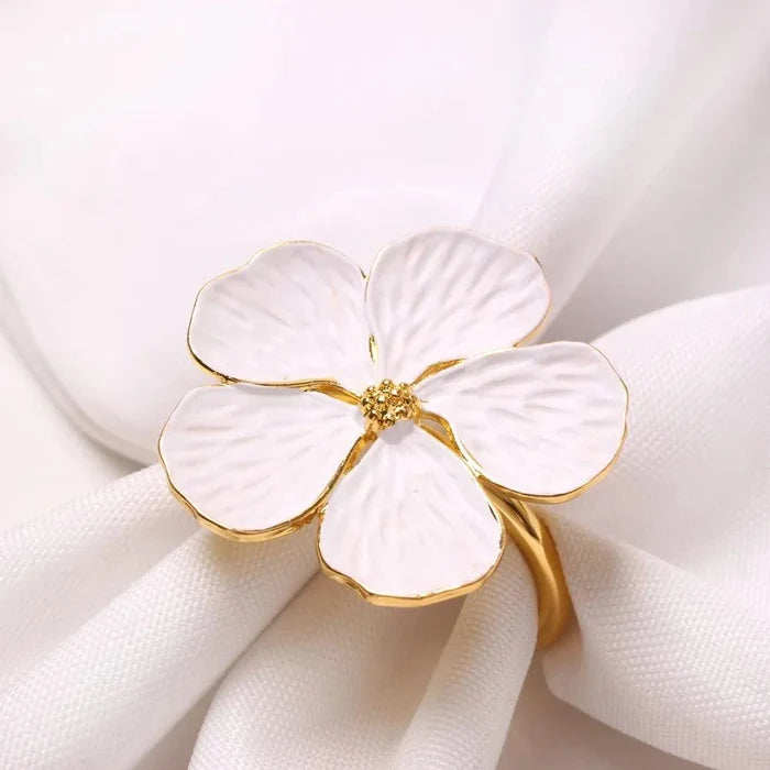 Set of 6 eco-friendly aluminum alloy plum flower napkin rings in white, gold, and silver colors