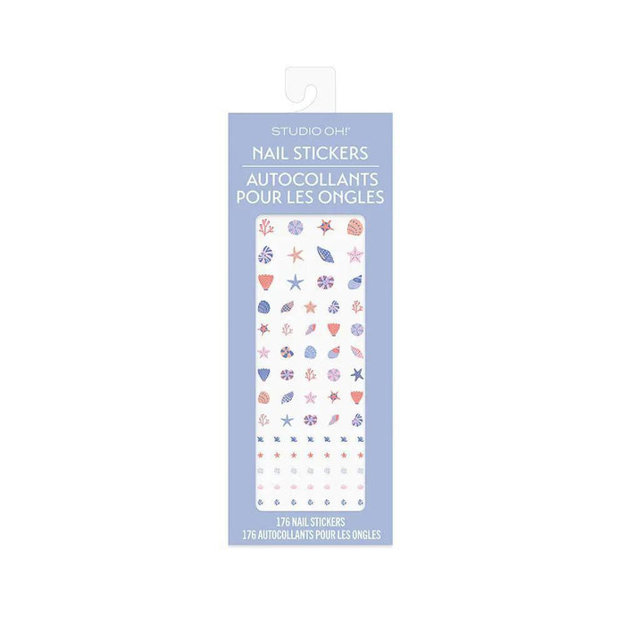 “Coastal Beach Nail Stickers by Studio Oh” – Laid flat with seashells and a sunhat

“Peel & Stick Sea-Themed Nail Art” – Close-up showing seashell and starfish designs