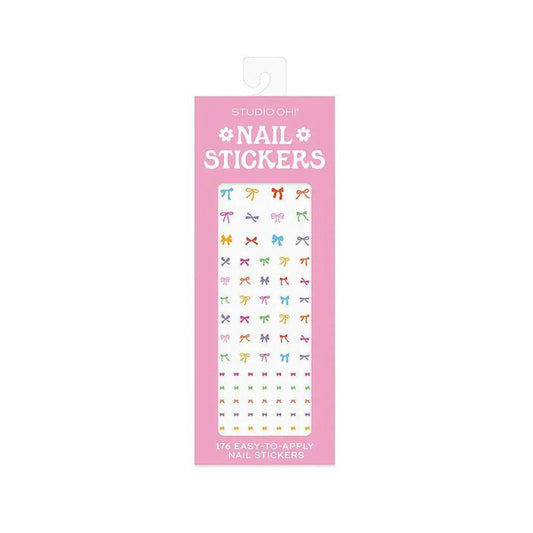 “Studio Oh Nail Sticker Sheet” – Flat lay of sticker pack with colorful nail polish bottles

“Peel and Stick Nail Art” – Close-up of vibrant stickers with bows