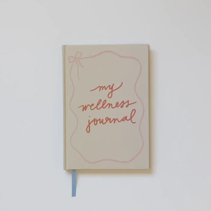 “Colorful Wellness Journal” – Open journal with playful hand-drawn pages and bright stationery

“Self-Care Journal for Women” – Flat lay of journal with tea, flowers, and cozy wellness vibes