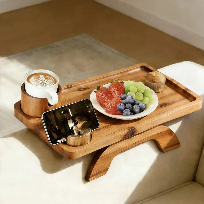 Clip sofa armrest tray with 360° rotating phone holder in natural acacia wood on a couch armrest