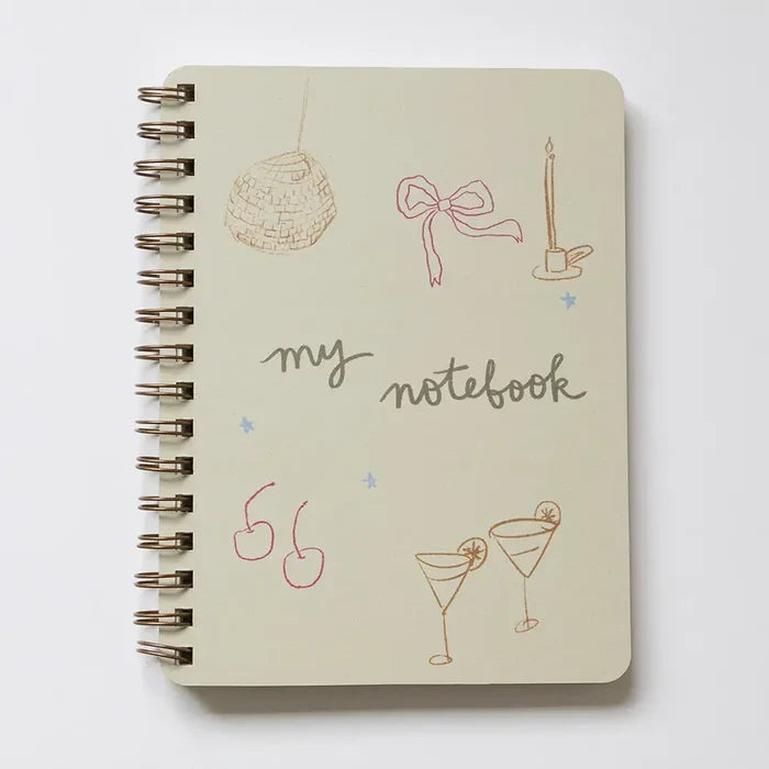 “Disco Bow Notebook Flat Lay” – Spiral notebook styled with glitter pens, lip gloss, and heart-shaped accessories

“Cool Girl Stationery” – Close-up of notebook cover with bold disco bow design and spiral detail