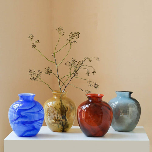Elegant lustrous glass vase with smooth finish for modern home decor