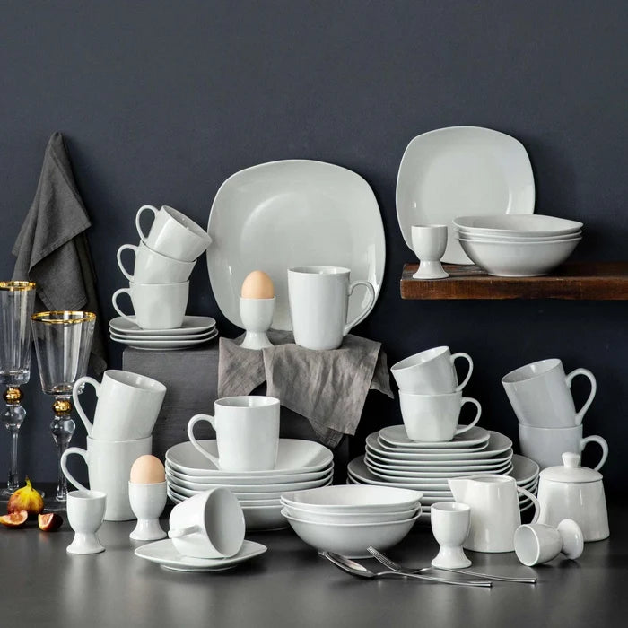 MALACASA Series Elisa 50-piece porcelain dinnerware set with plates, bowls, cups, and accessories in cream white solid design