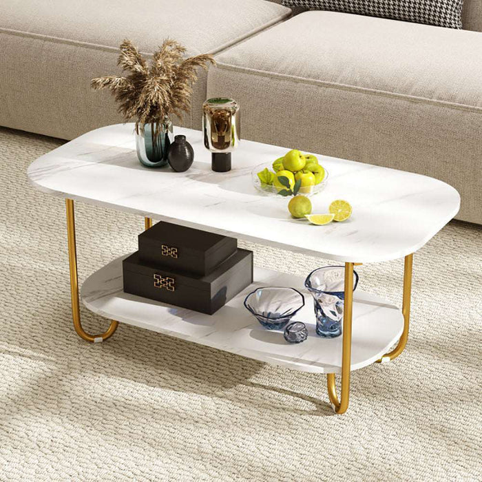 Modern 2-tier faux marble top coffee table with gold metal frame and lower shelf in living room