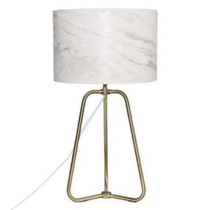 Small modern stylish desk lamp with marble-patterned shade and bronze base on wood table