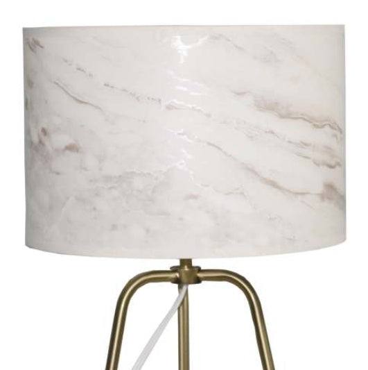 Small modern stylish desk lamp with marble-patterned shade and bronze base on table