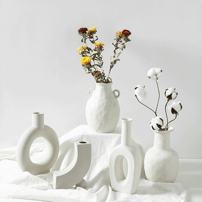 Minimalist Nordic ceramic vase with elegant sculptural design for home decor