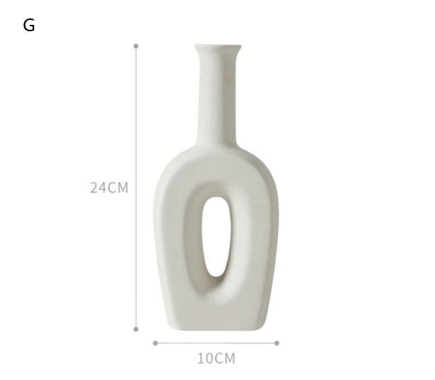 Minimalist Nordic ceramic vase with matte glaze on white background