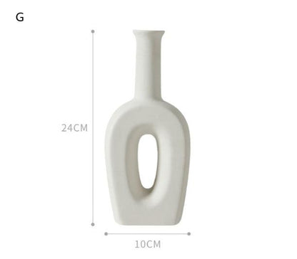 Minimalist Nordic ceramic vase with matte glaze on white background