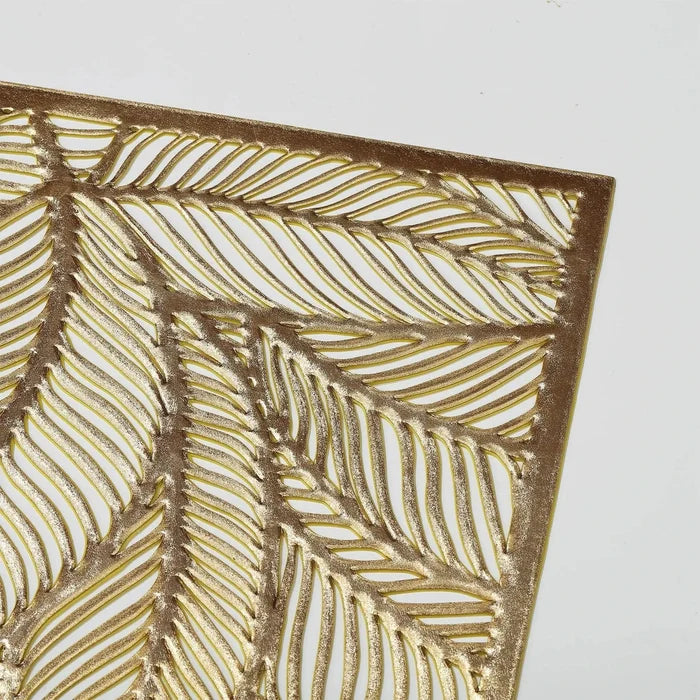 Golden rectangle table mat with hollow leaf design made of durable PVC and vinyl